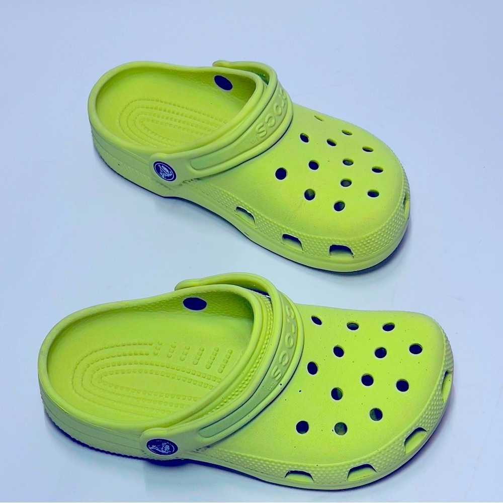 CROCS Girls Size J2 Lime Green. 

Small speckling on top of shoe. See photos.